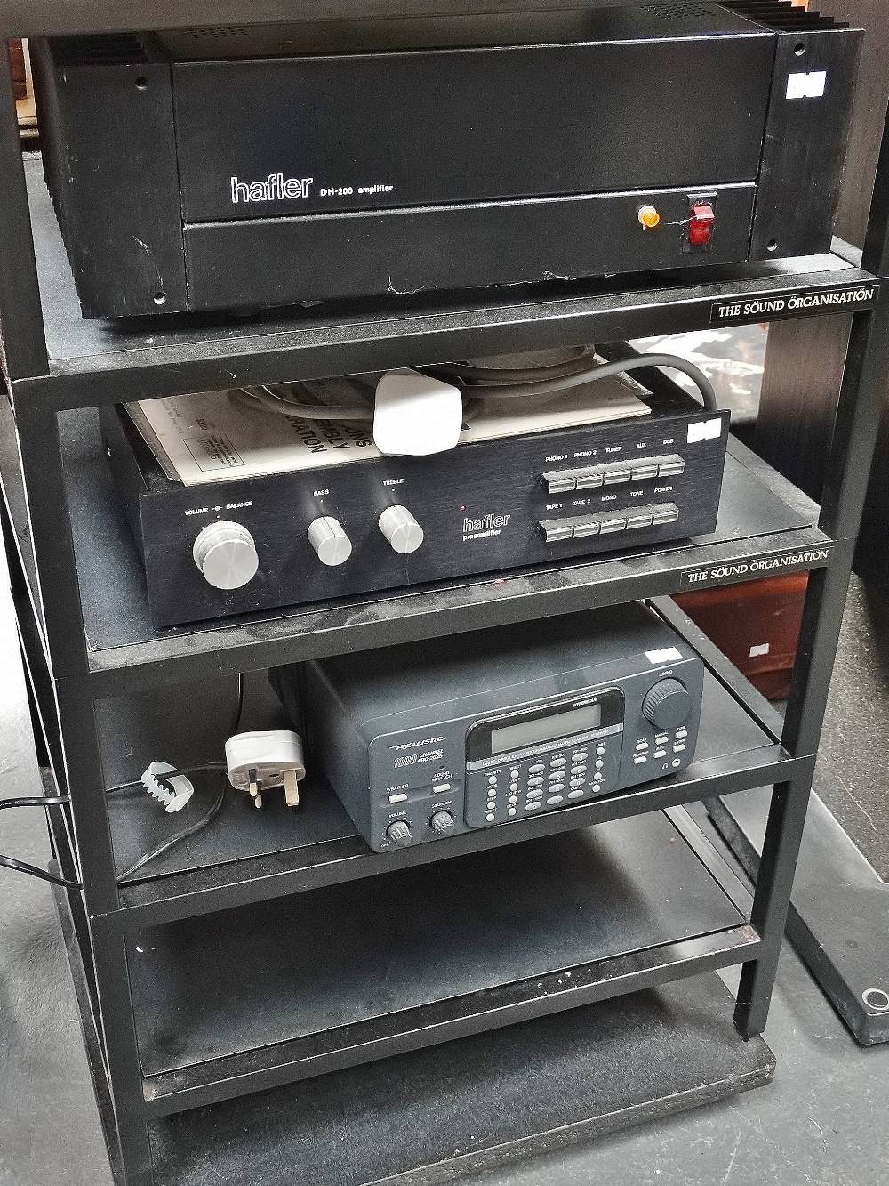 A Hafler DH-200 amplifier, together with a pre amplifier and a realistic 1,000 channel Pro-2035