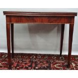 A George III mahogany tea table with moulded edges above square section tapering legs, width 86cm.