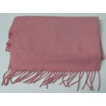 A Yves Saint Laurent pink cashmere scarf.