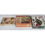 Two Meccano army sets, two Meccano 4/two Meccano crane sets and one Meccano airport service set.