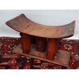 An early 20th century Ashanti style stool, West Africa circa 1900, width 41cm.