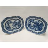 A pair of 18th century Chinese export blue and white platters decorated with pagoda lake landscapes,