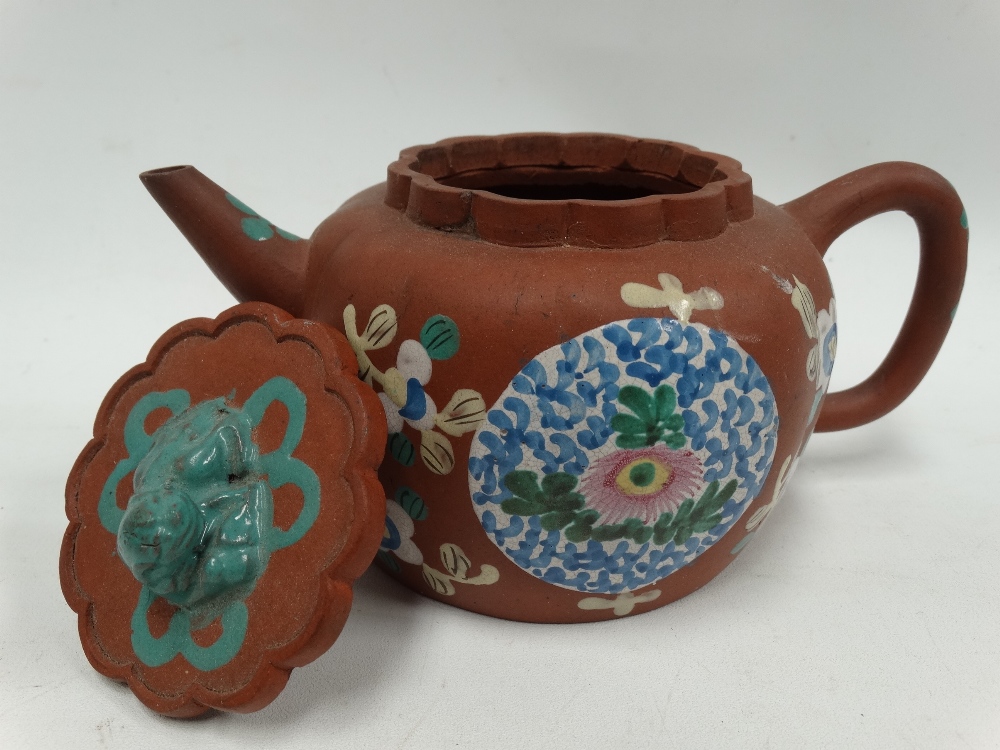 A Chinese Yixing teapot and cover of squat lobed ovoid form and decorated with foliate enamels, - Image 2 of 2