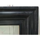 A large ebonised picture frame Overall size 227 x 143cm Aperture size 190 x 105cm Provenance: