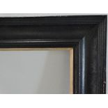 A large ebonised picture frame Overall size 163 x 116cm Aperture size 147 x 99cm Provenance: