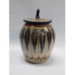 ROELOF UYS A sgraffito decorated lidded urn Signed and dated 2008 Height 20cm