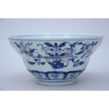 A Chinese bowl in underglaze red and blue porcelain 'fruits', Qianlong mark (10x20 cm) (*)