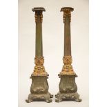A pair of bronze candlesticks with heads, 19th century (58 cm)
