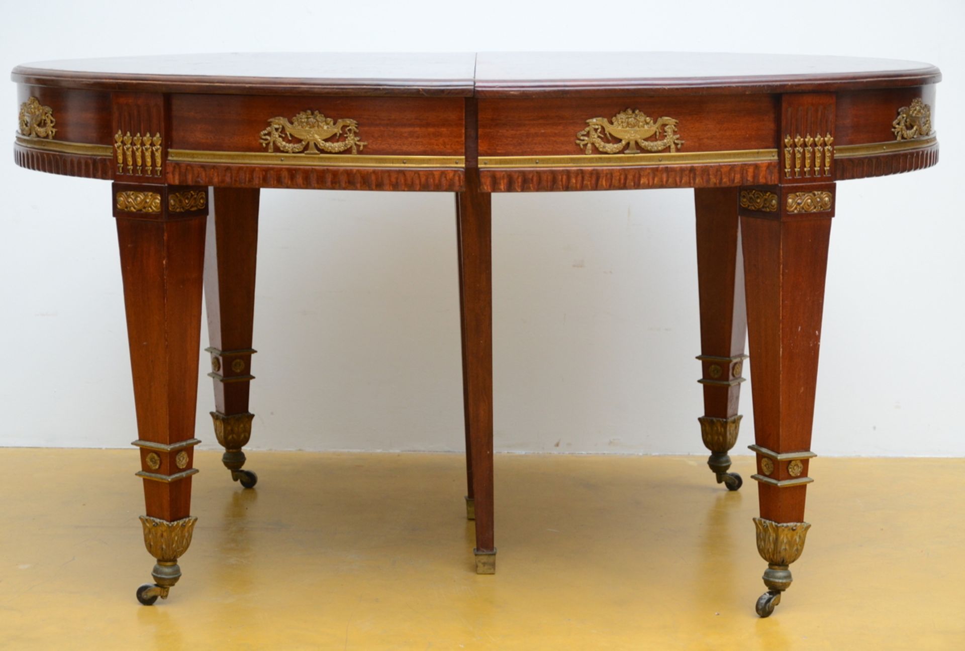 Empire style mahogany table with gilt bronze fittings (78x140x104 cm)
