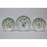 Three dishes in Chinese porcelain 'antiquities' (29 - 34cm)