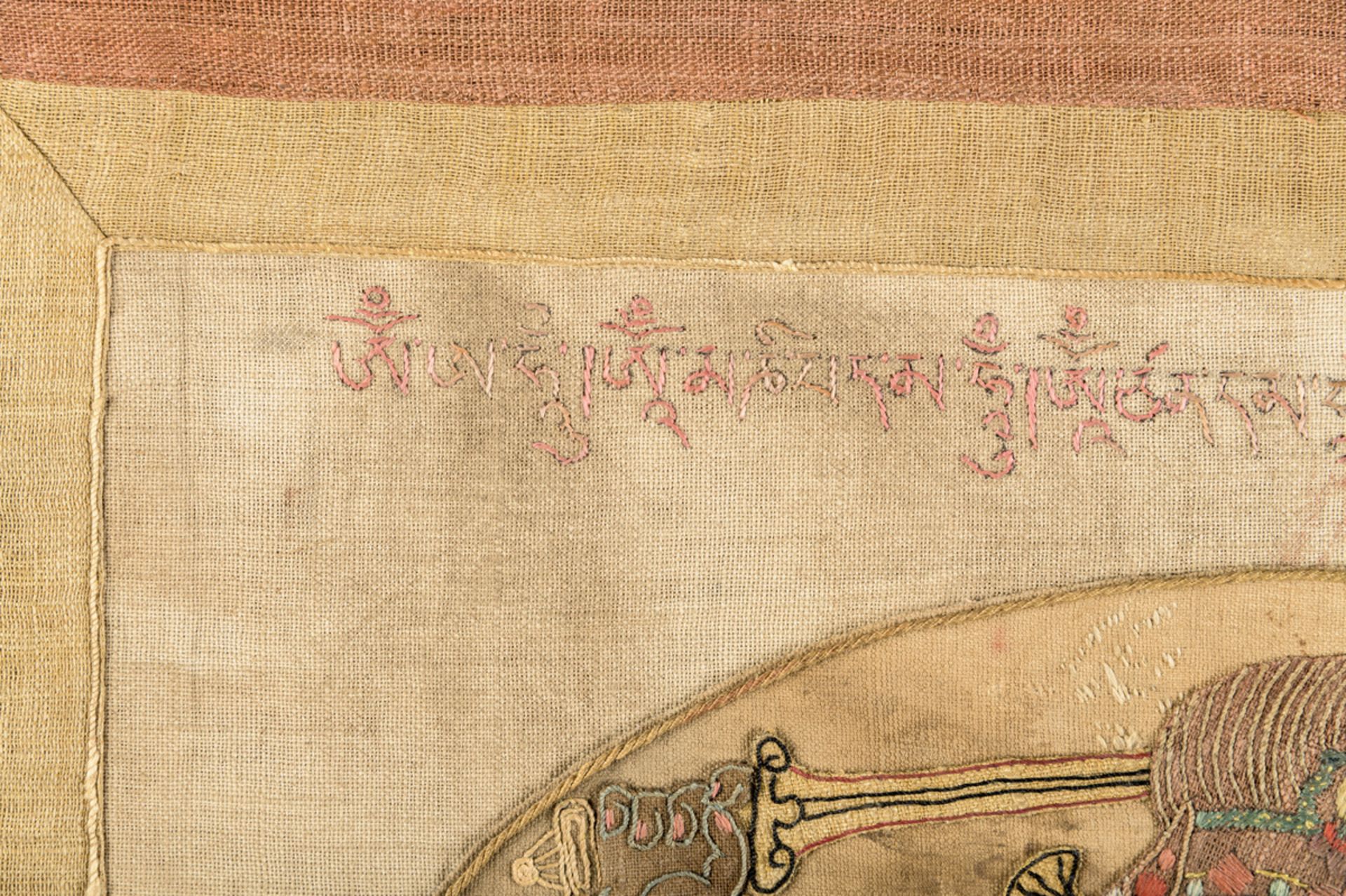 A rare silk appliqué thangka 'Achala', inscriptions (63x46 cm) - Image 7 of 10