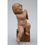 A sculpted wooden angel with polychromy (h 36 cm) (*)