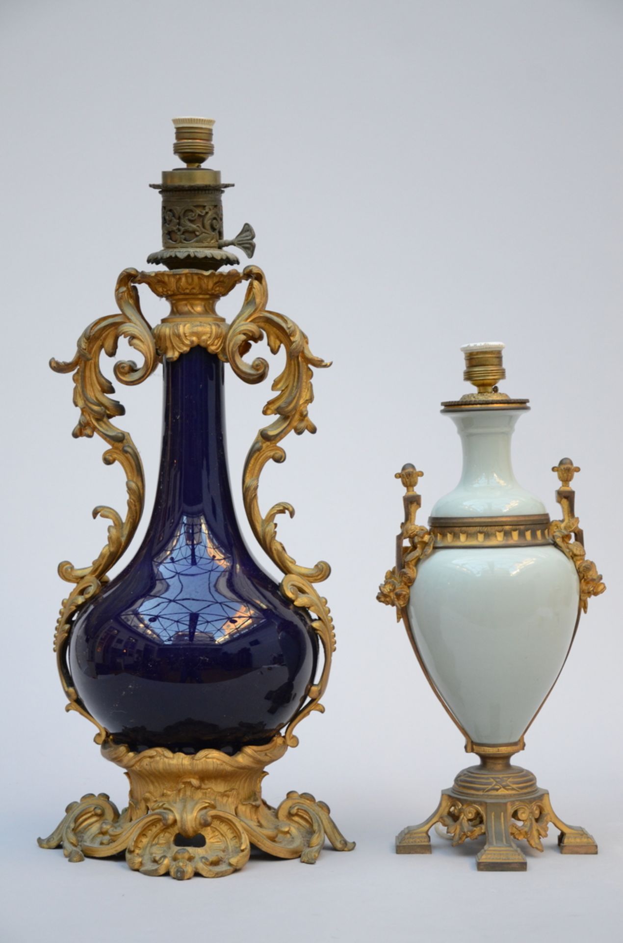 Two porcelain lamps with gilt bronze mounts (h46 - 67 cm)
