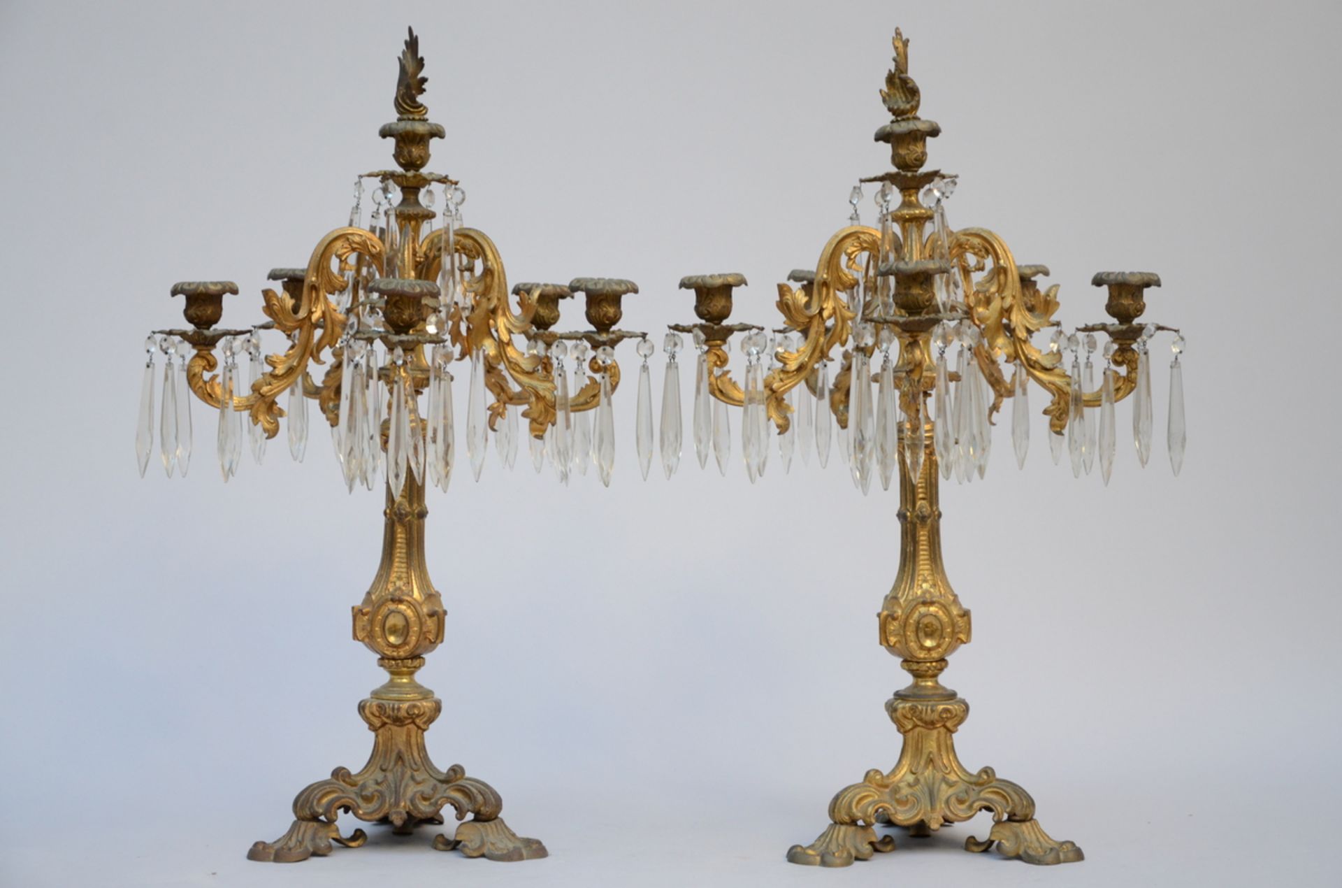 A pair of gilt bronze candlesticks with crystals (h75cm)