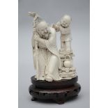 A Chinese ivory statue 'sage with servant', 19th century (14.5 cm)