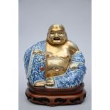 Fat Buddha in Chinese blue and white porcelain, marked (20 cm)