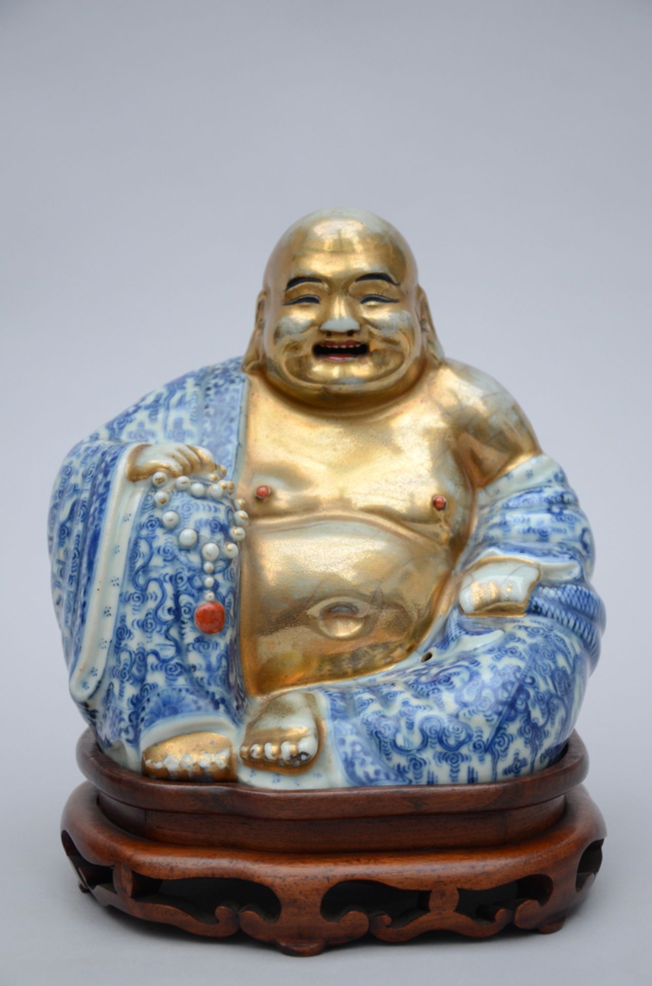 Fat Buddha in Chinese blue and white porcelain, marked (20 cm)