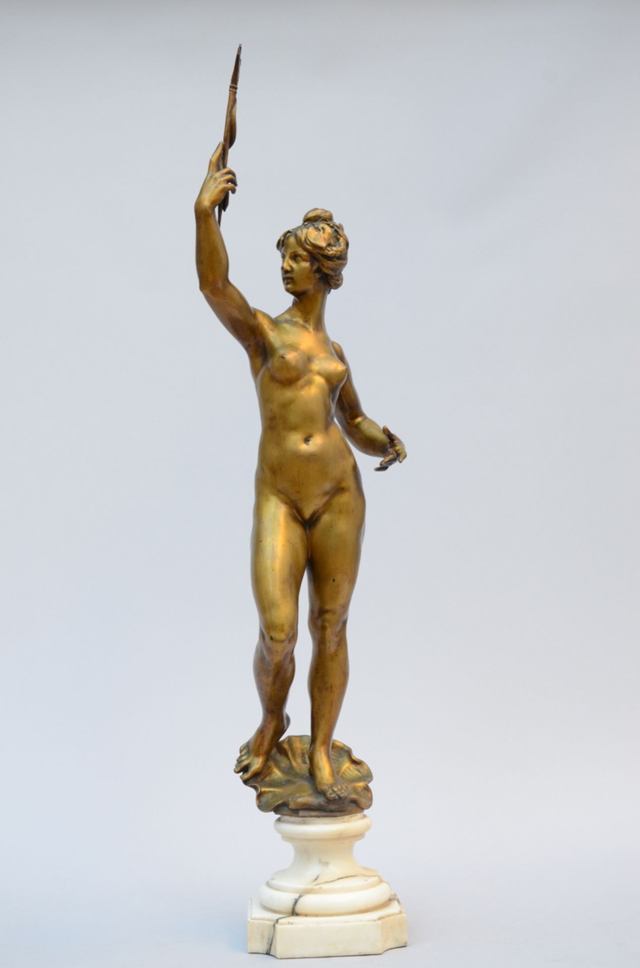 Statue in gilt bronze on a marble base 'female nude' (h 99 cm)