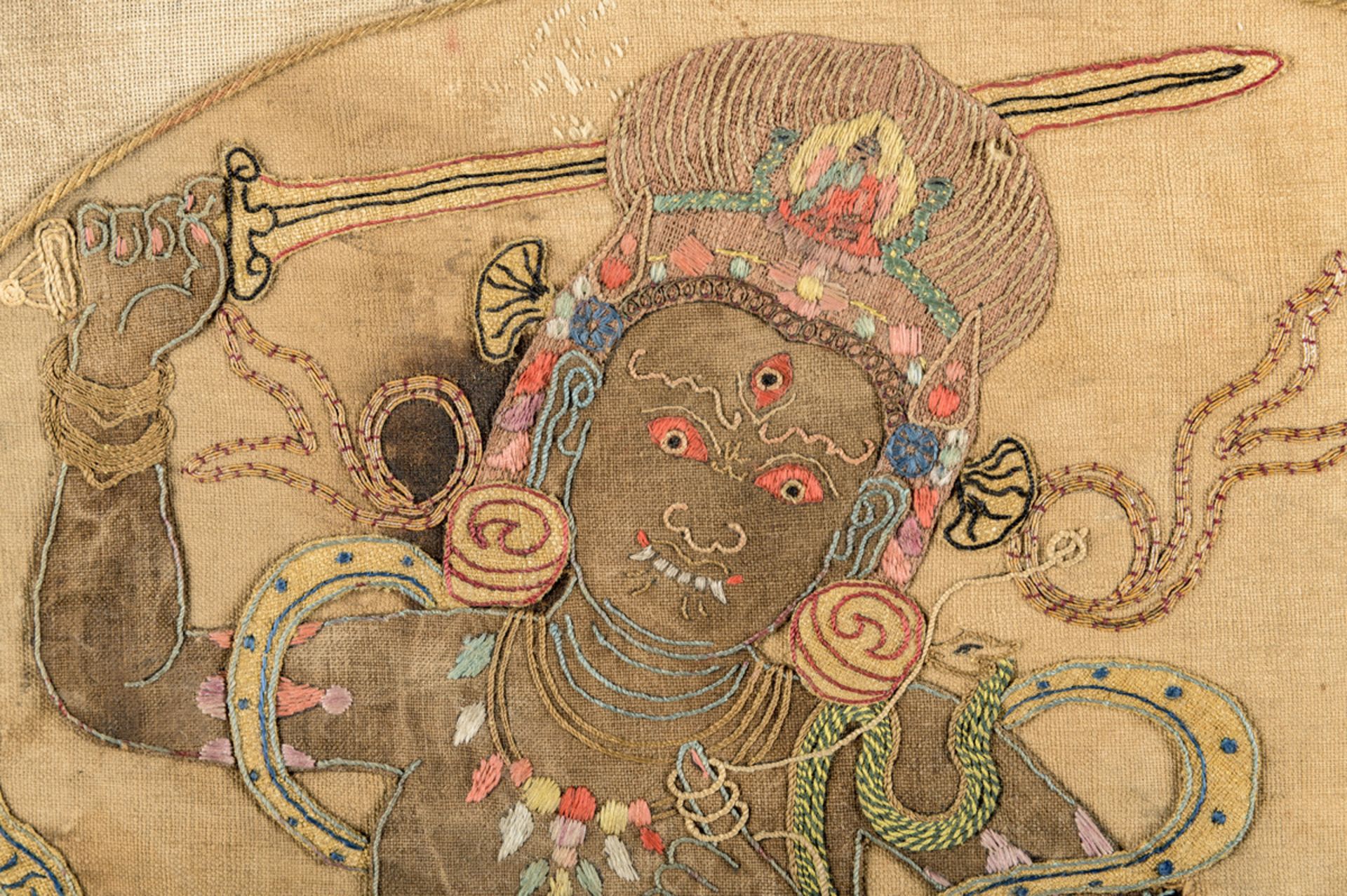 A rare silk appliqué thangka 'Achala', inscriptions (63x46 cm) - Image 6 of 10