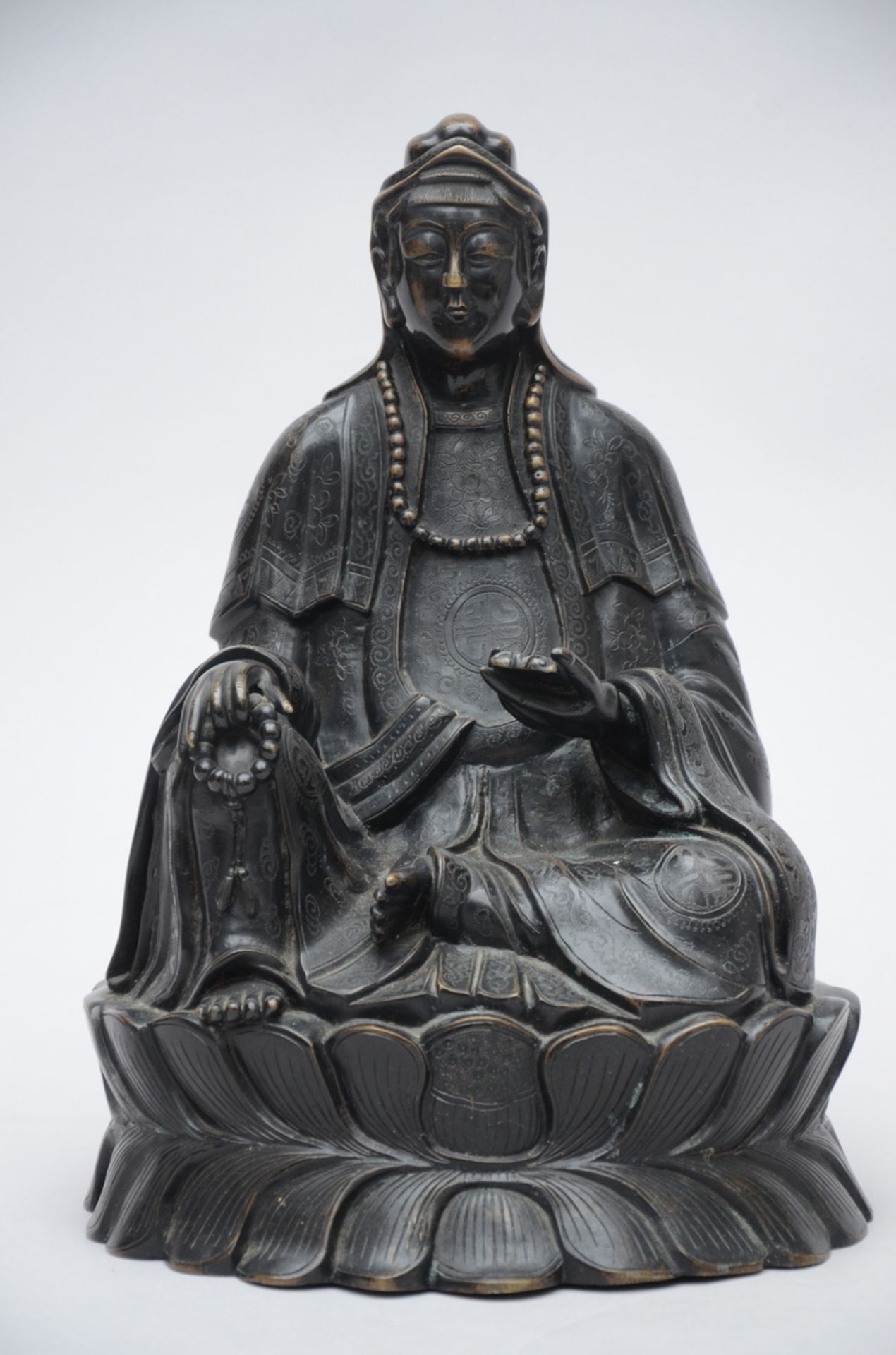 A Buddhist sculpture in bronze, Asia (38 cm)