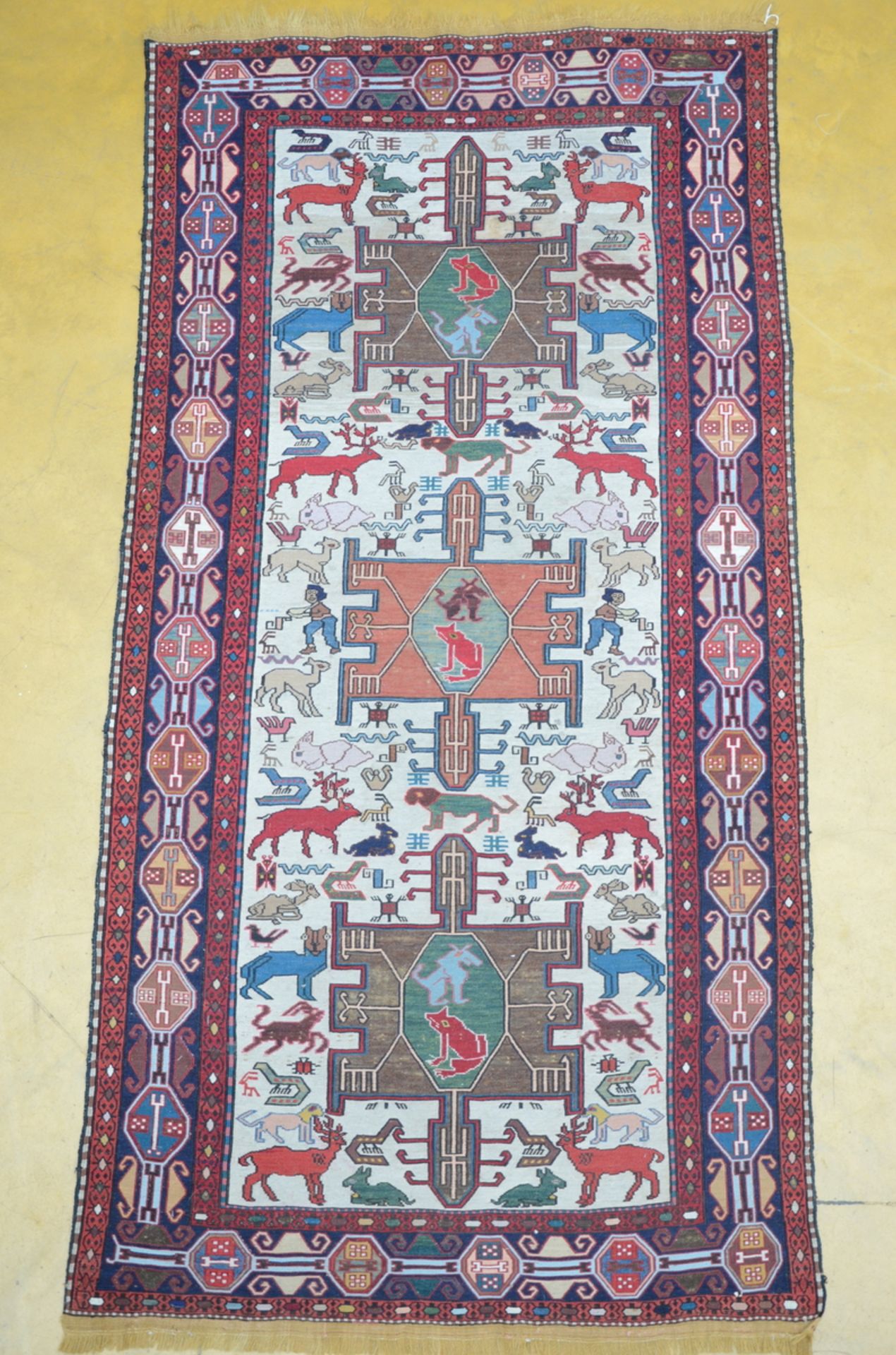 Caucasian carpet with geometric figures (200x100 cm)