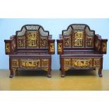 A pair of sculpted Chinese seats (87x84x57 cm)