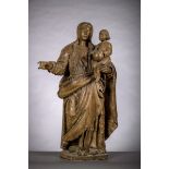 A walnut sculpture 'Standing Virgin and Child' (96 cm) (*)