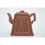 Chinese teapot in yixing with inscriptions (14x16x6,5 cm)