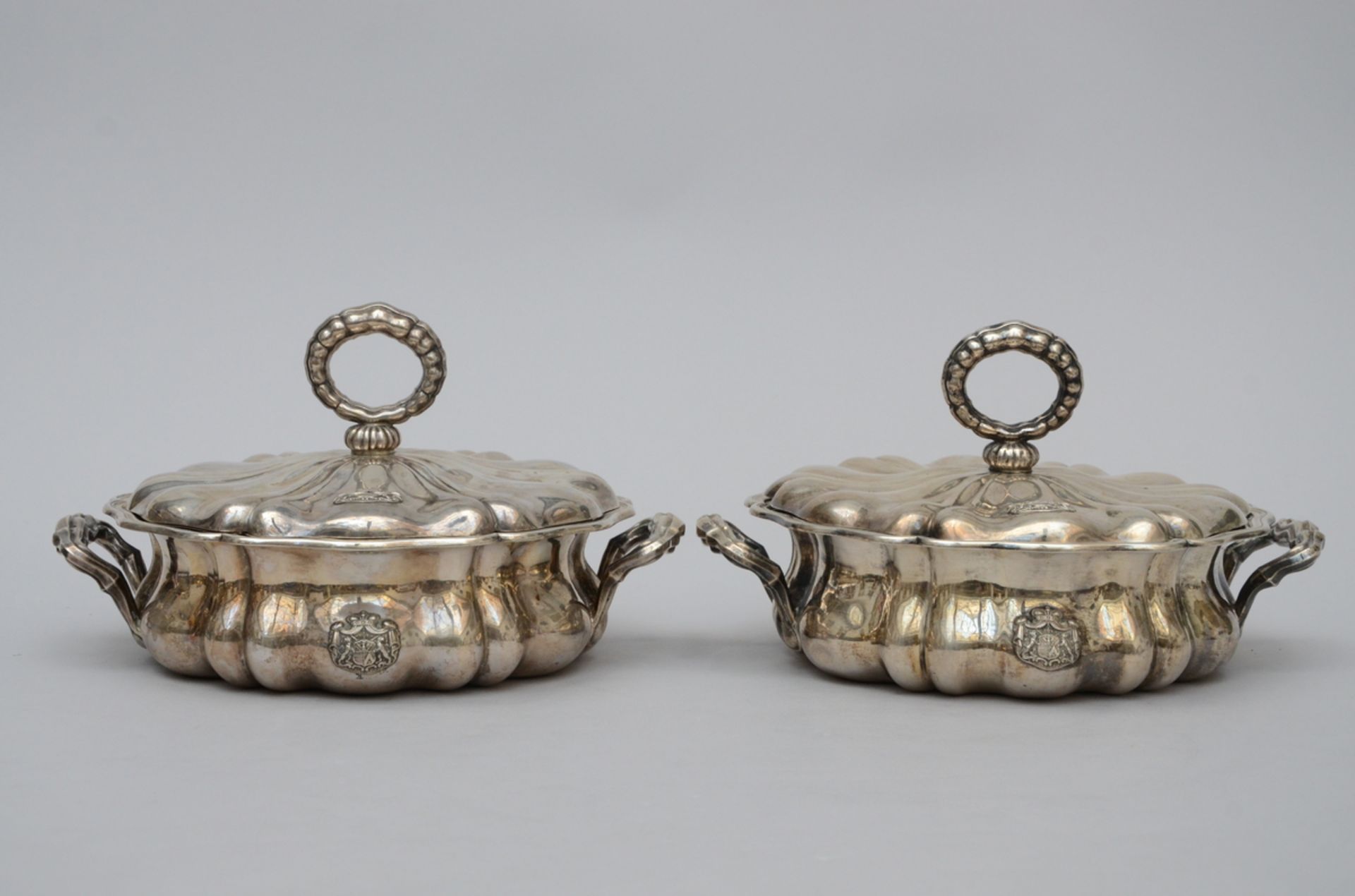 A pair of silver armorial vegetable tureens by Mayerhofer & Klinkosch, Vienna 19th century (