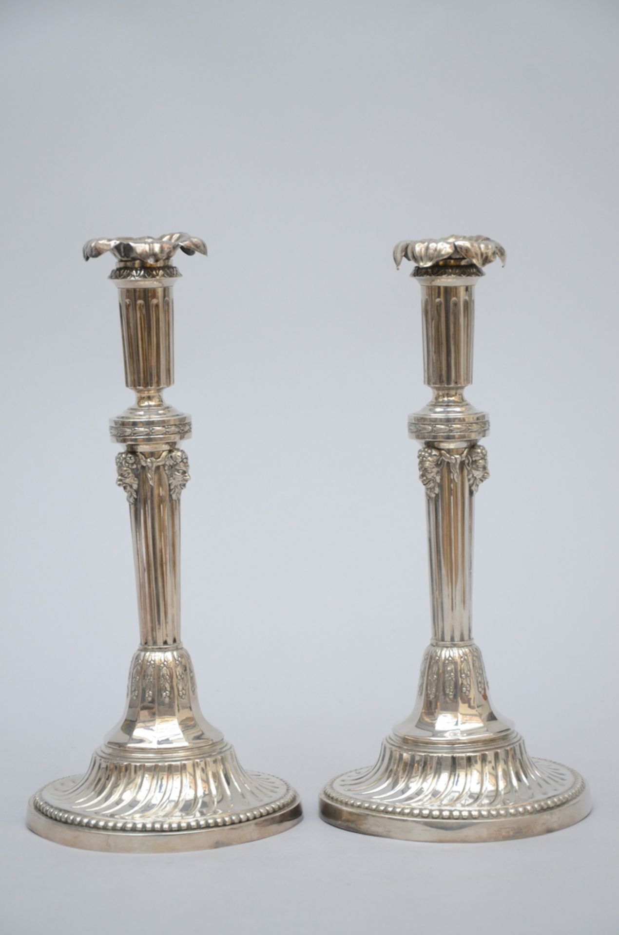 Pair of Louis XVI candlesticks in silver with 'faun heads', 18th century (31cm) - Image 2 of 3