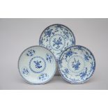 Three dishes in Chinese blue and white porcelain, 18th century (dia 28 cm)