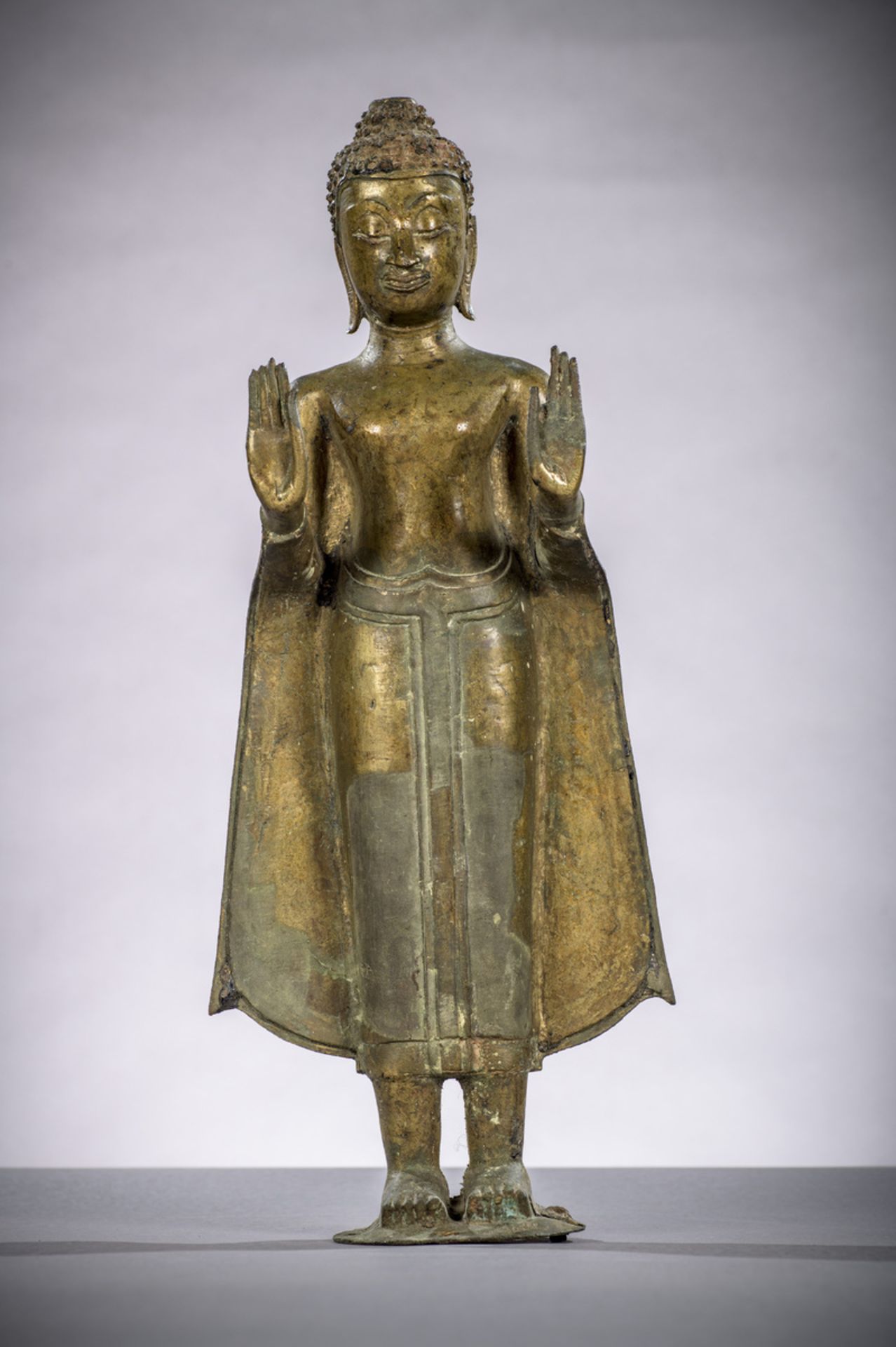A standing Buddha in bronze, Thailand (44.5 cm)