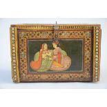An Indian cabinet with romantic scenes (19x19x22cm) (*)