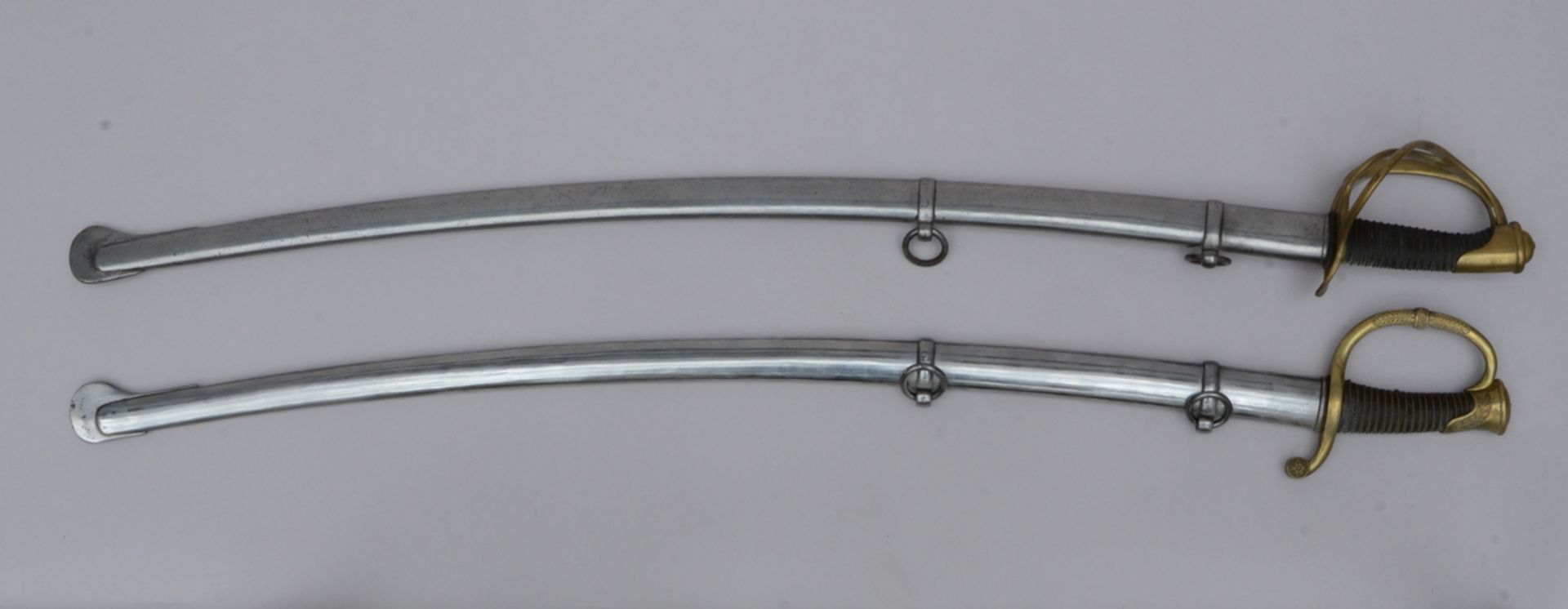 Two sabers, 19th century (length 109 and 110 cm)