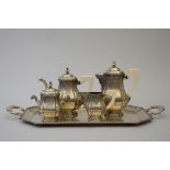 Four-piece silver coffee set on a serving tray, Louis XIV style (tray 69x36cm)