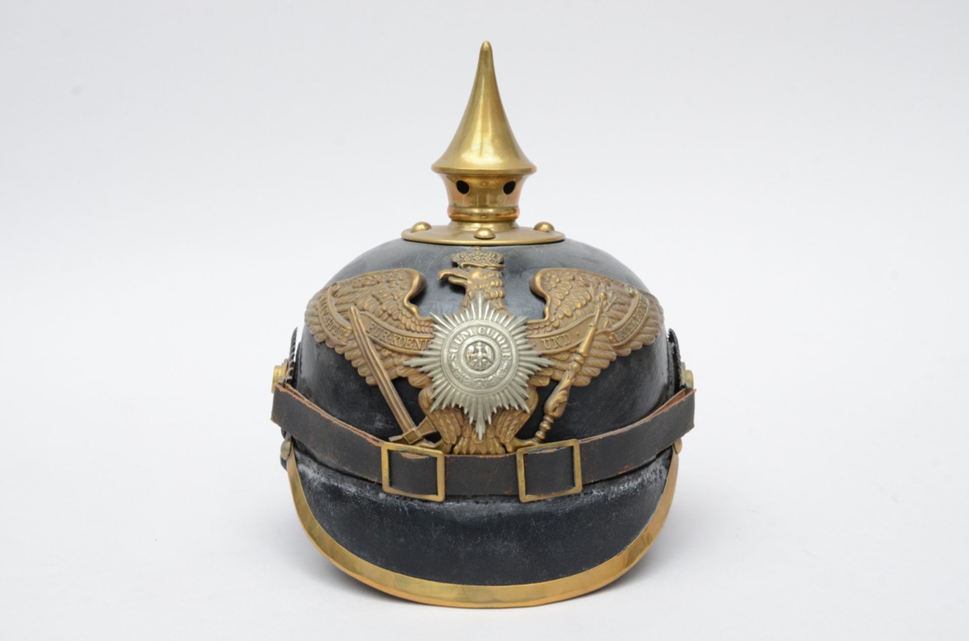 A Prussian pin helmet with leather 'guard infantry' (h23cm)