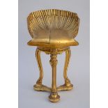 A gilt wood shell-shaped piano chair (h68x42x46cm)