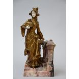A sculpture in gilt bronze and ivory on a marble staircase 'lady with a treasure box', 19th