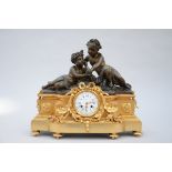 Gilt bronze clock 'putti', by Raingo FrËres ‡ Paris (44x50x15cm)