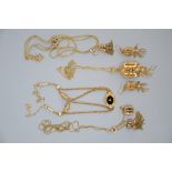 Lot: 4 gold necklaces + a pair of earrings