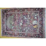 Two Oriental rugs 'animals' and 'flowers' (225x146cm) and (215x140cm)