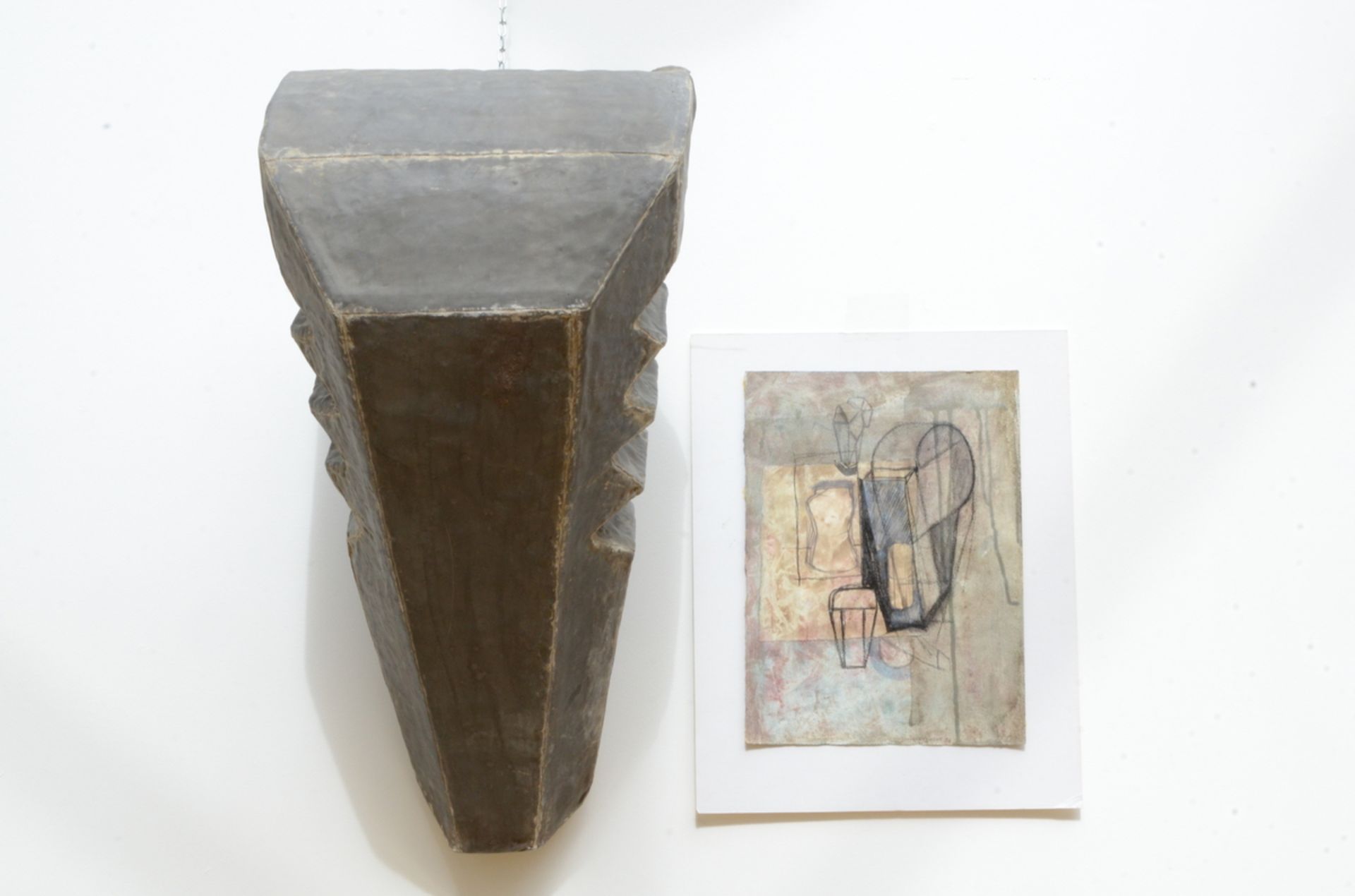 Jeroen Daled: sculpture 'protector 1990' lead on polyester (80x40x38cm) and drawing (28x38cm)
