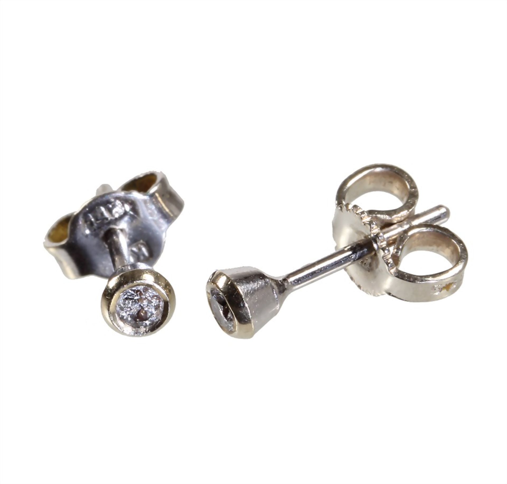 a  pair of ear studs, white gold 585/000, 2 brilliants c. 0.08 ct w-si