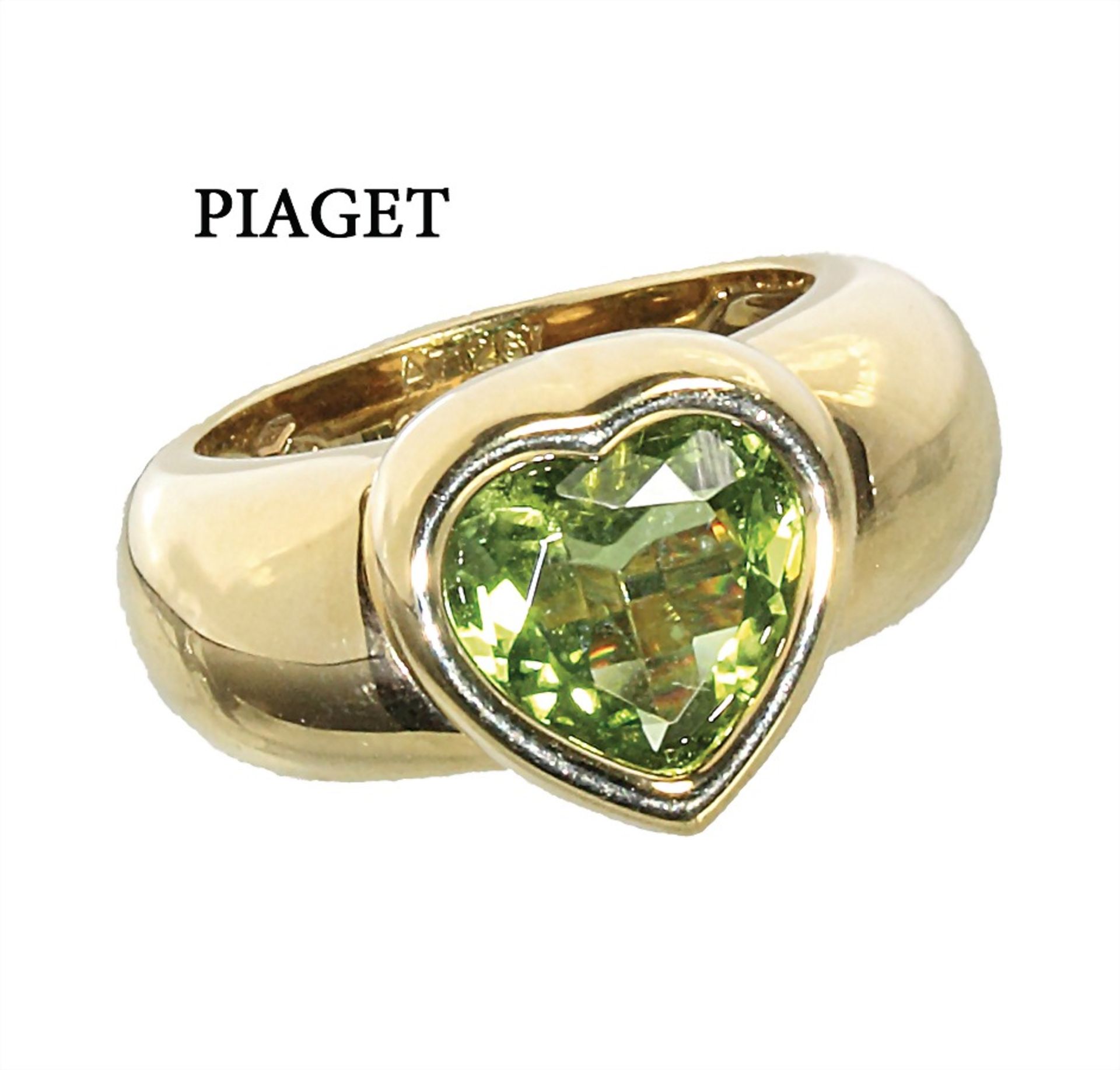 Ring PIAGET 1997, GG 750/000, sig. N° A 71267 PIAGET 1997, Peridot in Herzform geschliffen ca. ...