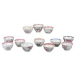 TWELVE CHINESE FAMILLE ROSE PORCELAIN TEACUPS, 18th CENTURY