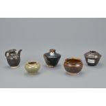 FOUR CHINESE SONG TO MING BLACK GLAZED POTS