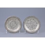 A PAIR OF EGYPTIAN SILVER PLATES