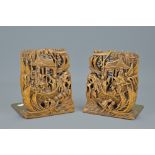 A PAIR OF CHINESE CARVED WOODEN BOOKENDS