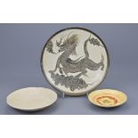 TWO CIZHOU WARE DISHES AND A WHITE GLAZED DING TYPE PHEONIX DISH
