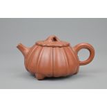 A CHINESE YIXING POTTERY TEA POT